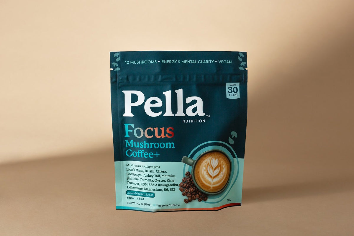 A bag of Pella Focus with a creamy latte