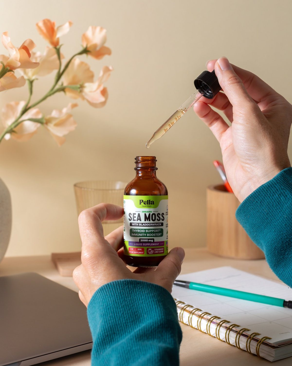 Sea Moss Drops bottle in a bright lifestyle setting