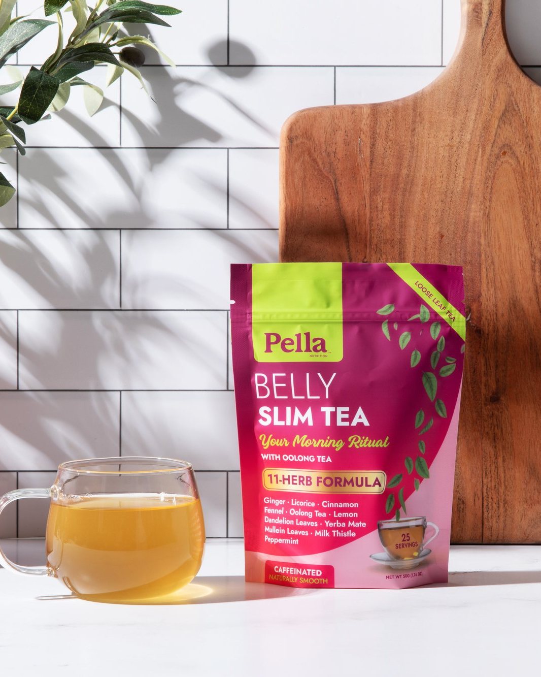 Belly Slim loose leaf tea pouch with a cup of brewed tea