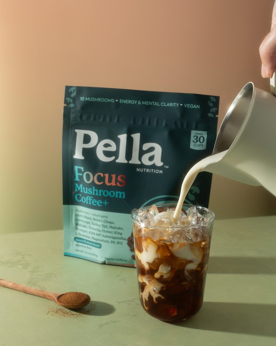 Milk being poured into a Pella coffee